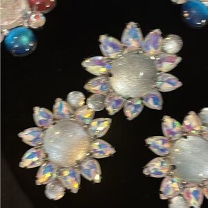 Elegant Silver and Iridescent Flower Earrings and ring